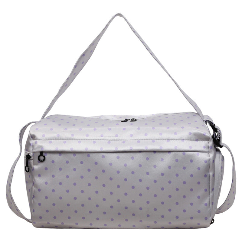 Stylische gepunktete Reisetasche