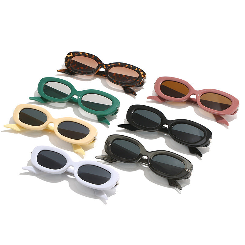 Damen modische Sonnenbrille mit stilvollem, geschwungenem Rahmen Karnz