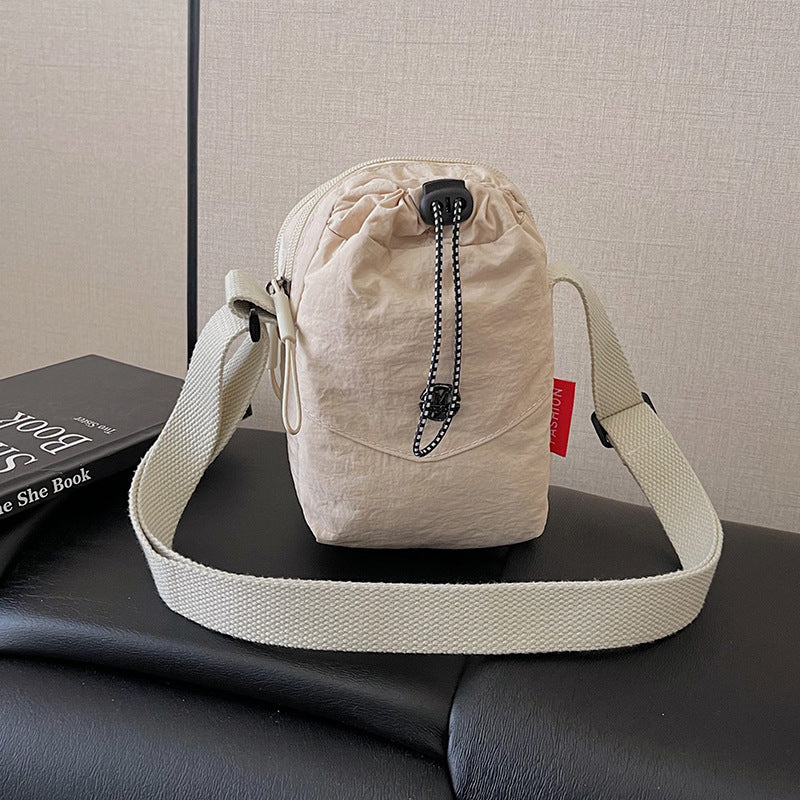 WoCompact Drawstring Crossbody Bag Karnz