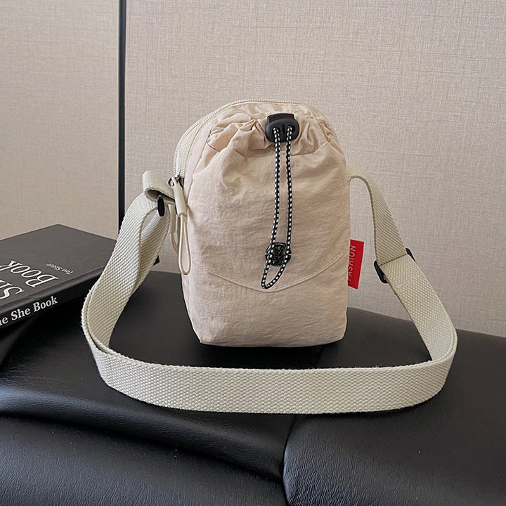 WoCompact Drawstring Crossbody Bag Karnz