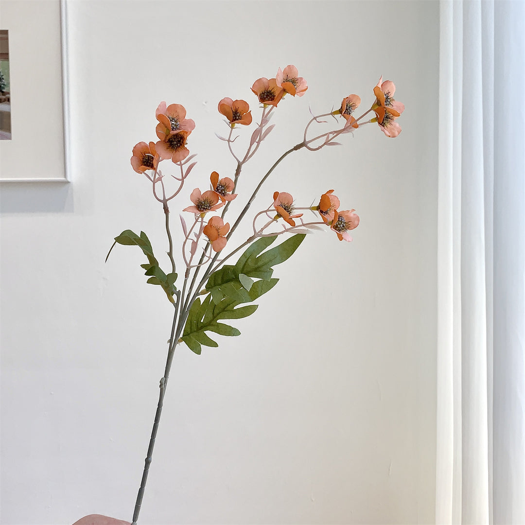 Dekorativer künstlicher Blumenzweig