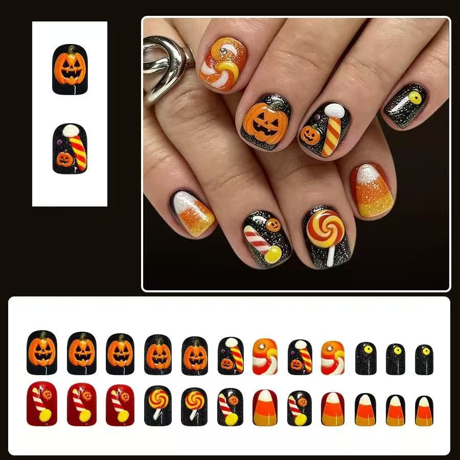 Halloween Kunstnagelset mit verspielten Kürbis- und Süßigkeitenmotiven Karnz