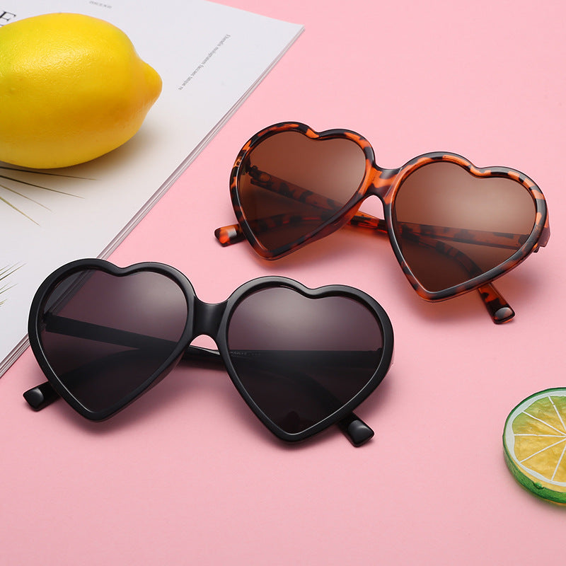 Damen Herzförmige Sonnenbrille mit stylishem Rahmen Karnz
