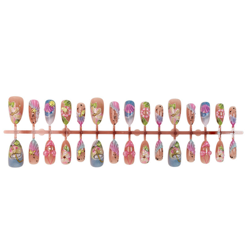 Kunstnagelset mit botanischen Designs und glamourösen Akzenten Karnz