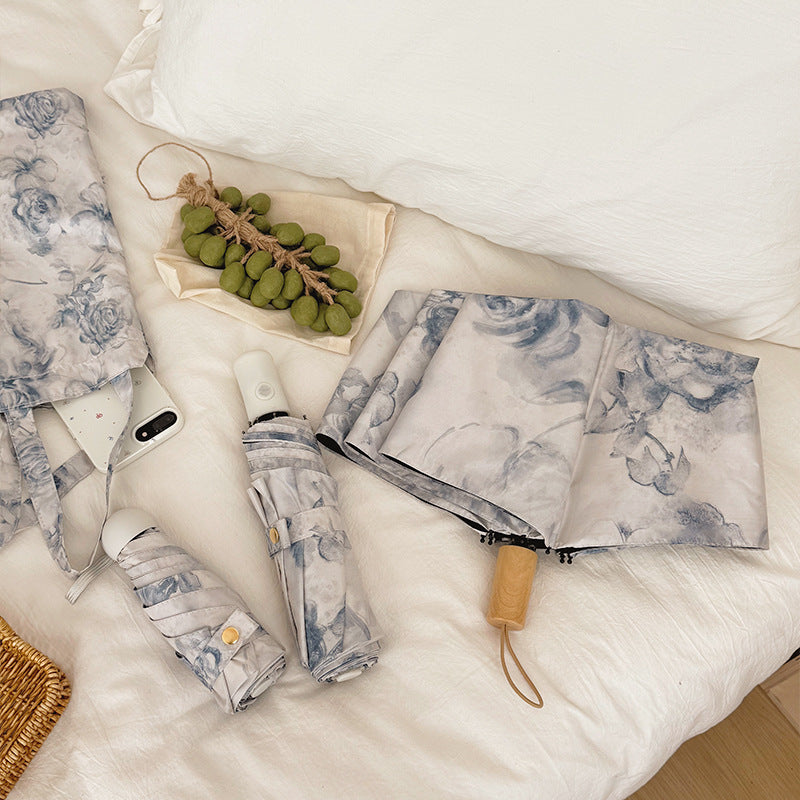 Damen Faltbarer Regenschirm mit floralen Motiven und Tragetasche Karnz