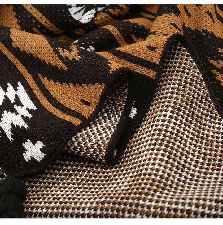 Gemütliche Strickwurfdecke