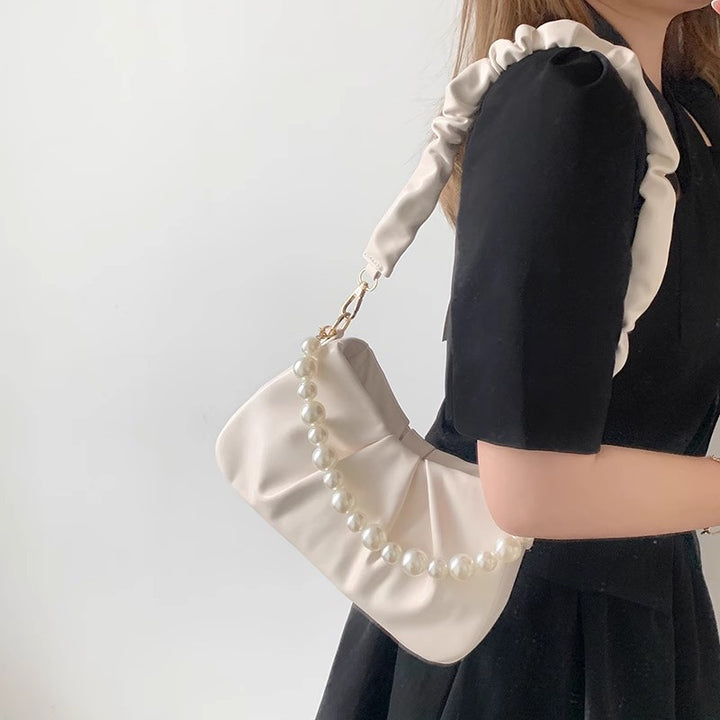 Elegante Perlenakzent Sling-Tasche Karnz