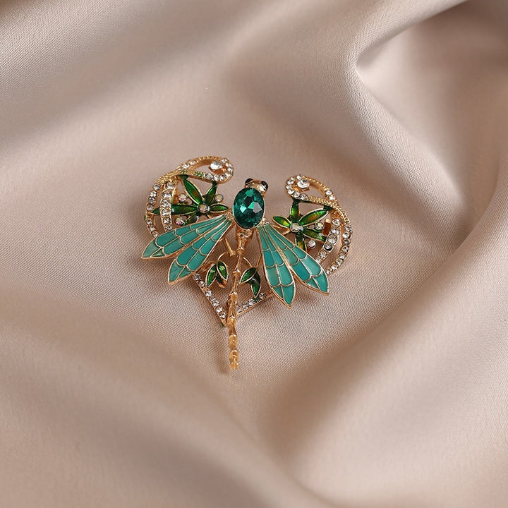 Exquisite Libellenbrosche mit Funkelnden Kristallen Karnz