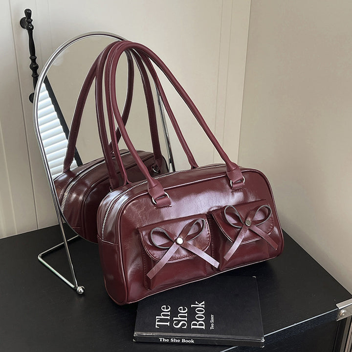 Stilvolle multifunktionale Handtasche mit Schleifendetail Karnz