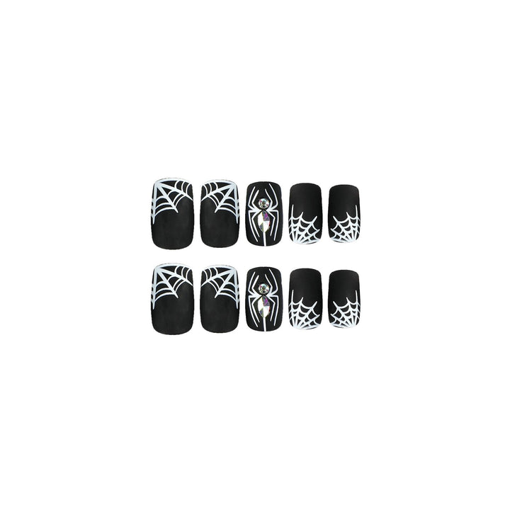 Kunstvolle Nagelverlängerungen mit Spinnen- und Spinnennetzdesign Karnz
