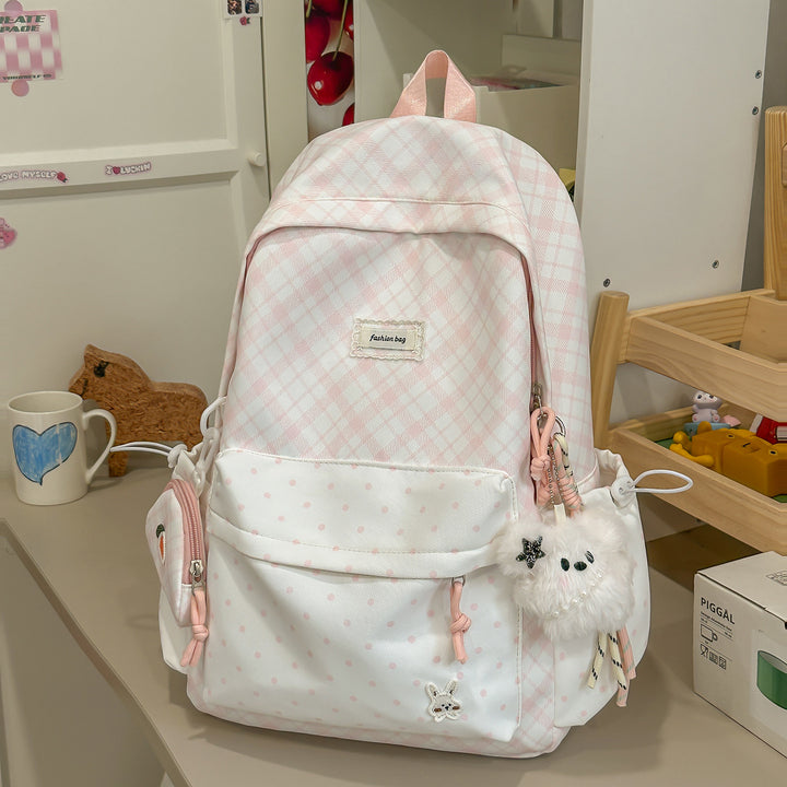Stylische Karomuster-Rucksack mit lustigen dekorativen Akzenten Karnz