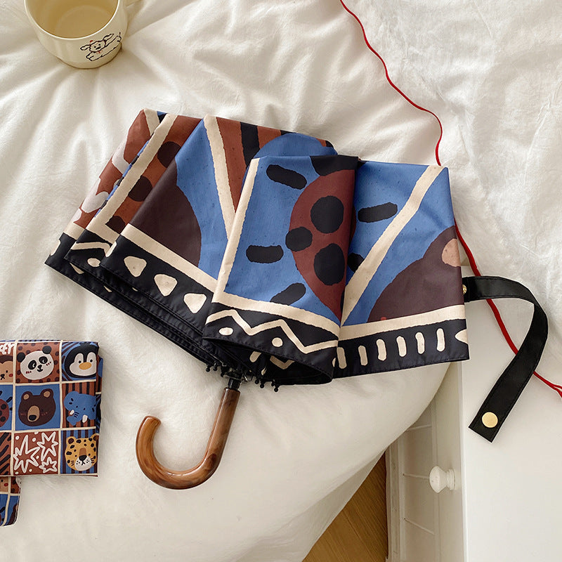 Damen Faltregenschirm mit kreativem geometrischem Design Karnz