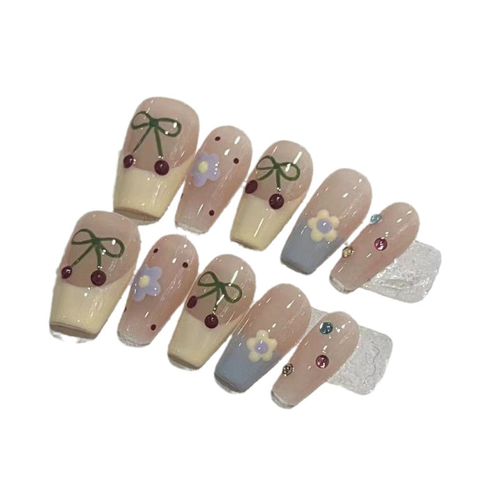 Charmantes dekoratives Press-On-Nagelset mit Kirsch- und Blumendesigns Karnz