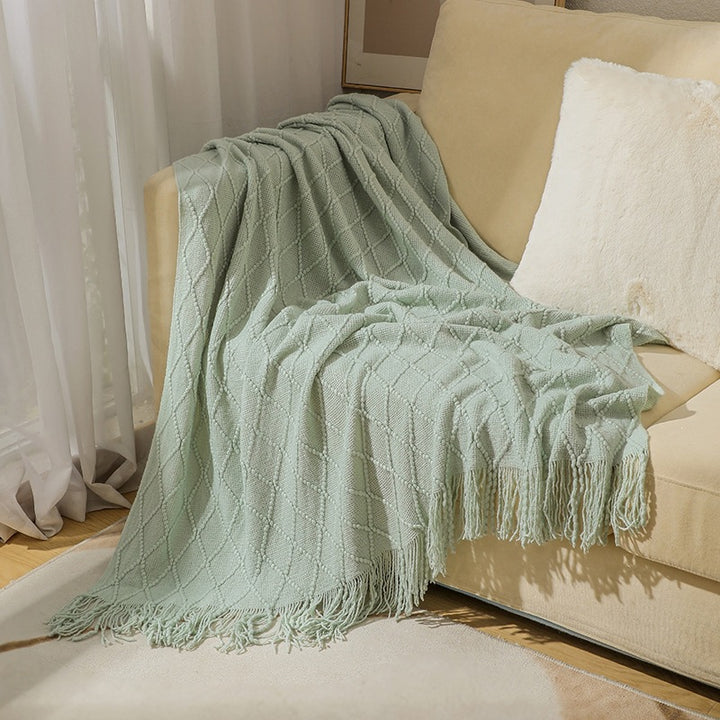Gemütliche strukturierte gestrickte Wurfdecke