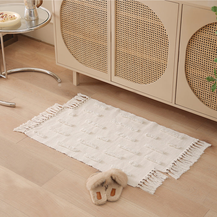 Gewebter Vorleger im Boho-Minimalstil mit kontrastiertem Tufting und Baumwollfransen Karnz