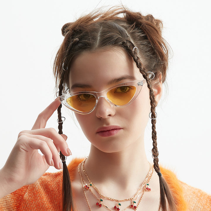 Damen Cat-Eye Sonnenbrille mit transparenter Rahmenkonstruktion und gelben Gläsern Karnz