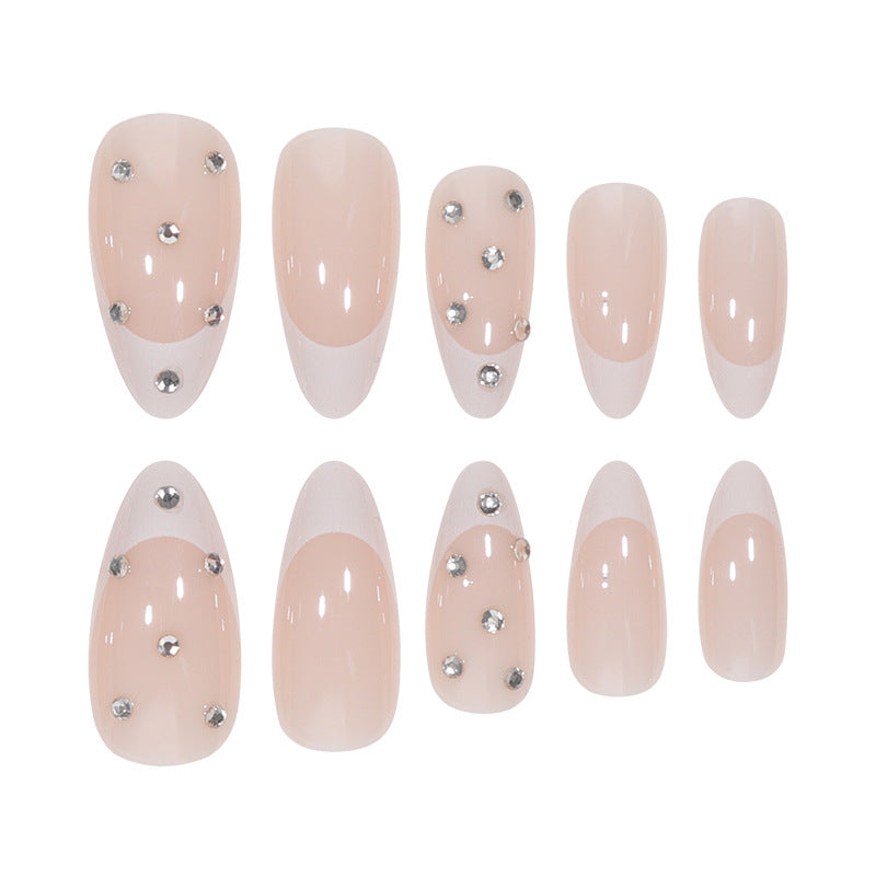 Elegante Stiletto-Nagelverlängerungen mit Strassakzenten Karnz