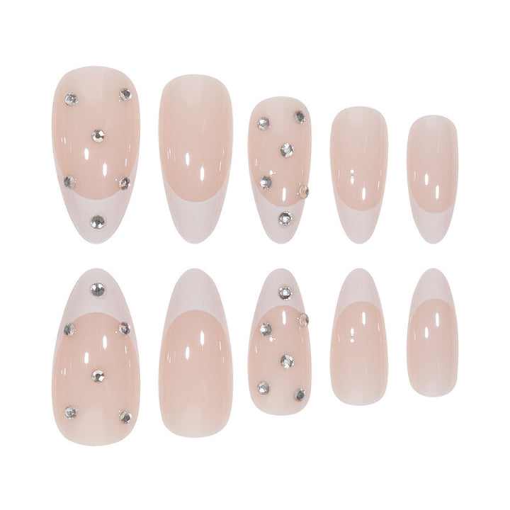 Elegante Stiletto-Nagelverlängerungen mit Strassakzenten Karnz