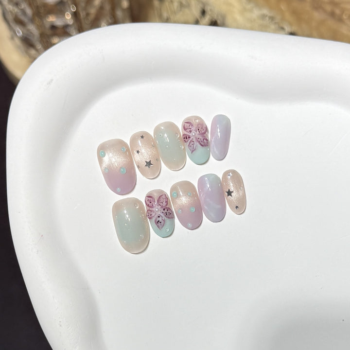 Floral-inspiriertes Press-On-Nagelkunst-Set mit Sternakzenten Karnz