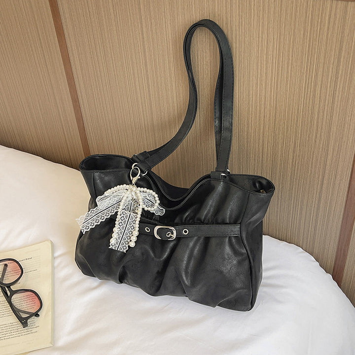 Elegante Leder Tragetasche mit dekorativen Akzenten