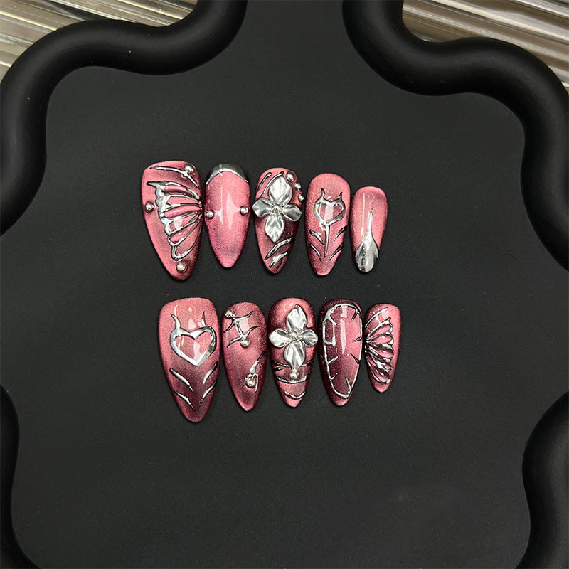 Dekorativer Press-On-Nagelset mit künstlerischen Elementen