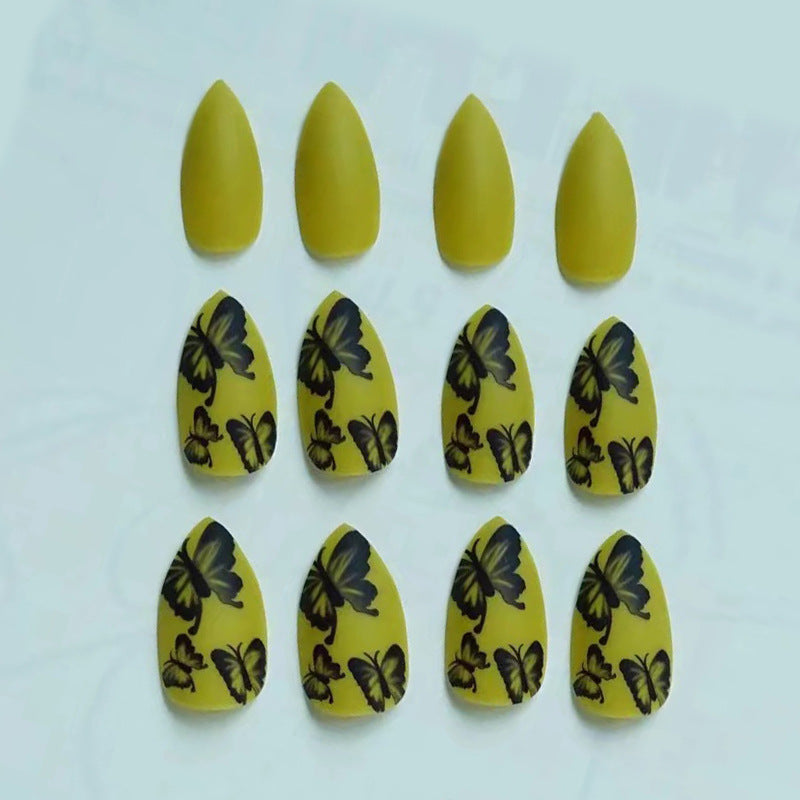 Künstlerisches Stiletto Press-On Nagelkunstset mit Schmetterlingsdesign