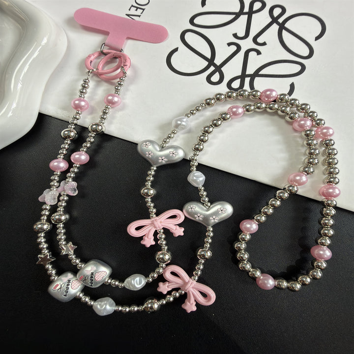 Mehrsträngige Perlenkette mit Charms Karnz
