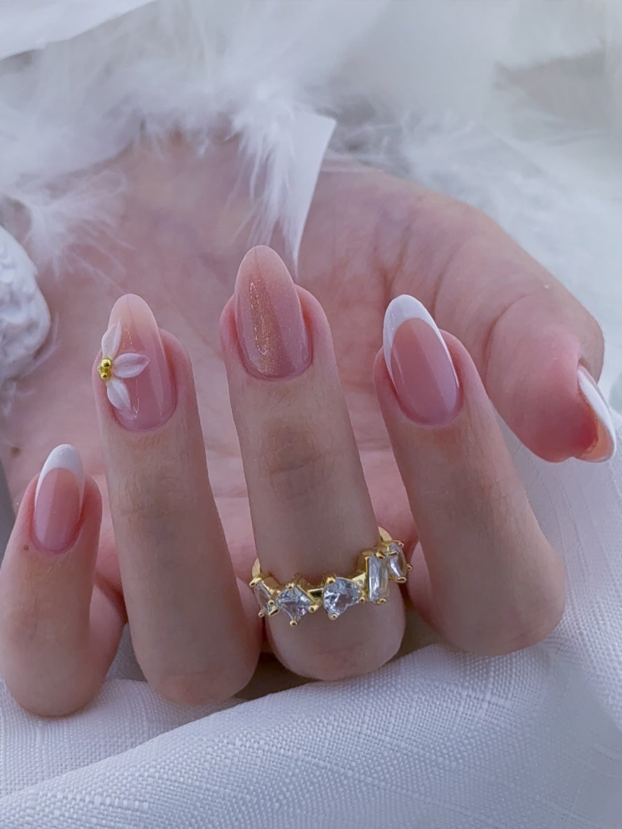 Künstlerisches Floral Press-On Nails Set mit eleganten Details Karnz