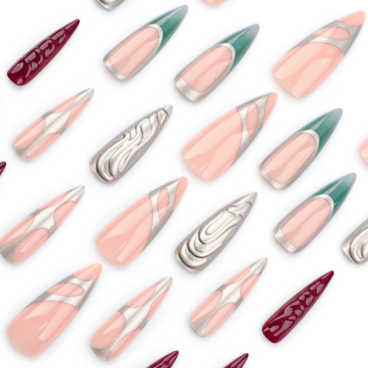 Kunstvolle Stiletto-Nägel mit Glitzer- und Metallic-Effekten Karnz