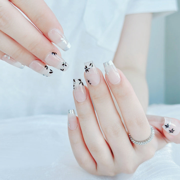 Künstlerisches Floral Press-On Nagelset mit glänzendem Finish