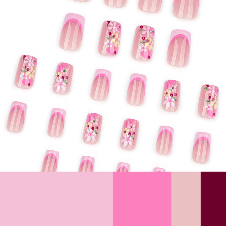 Kunstvolle Nagelgestaltung mit bunten Blumenmustern Karnz