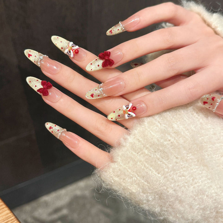 Dekoratives Press-On Nagelkunstset mit verzierten Blumen- und Edelsteinelementen