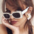 Damen extravagante quadratische Sonnenbrille mit stylishen Details Karnz