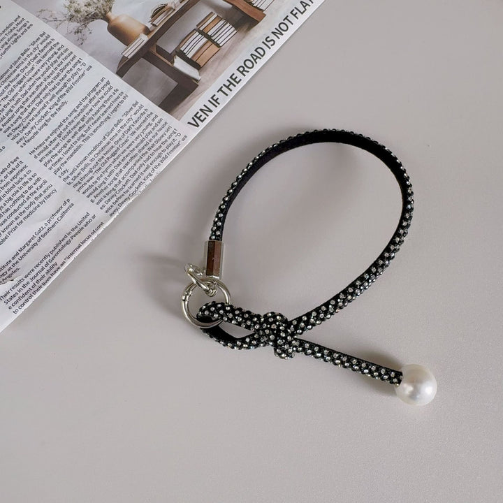 Elegante geknotte Perlenarmband-Band Karnz