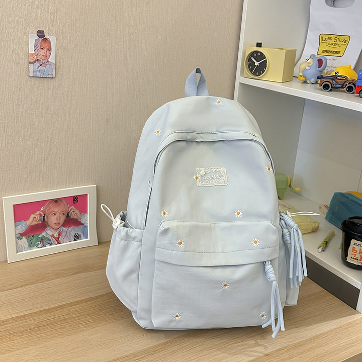 Stylischer backpack mit floralem Schmuck Karnz