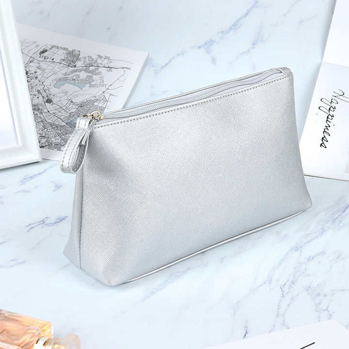 Elegante metallische Schminktasche