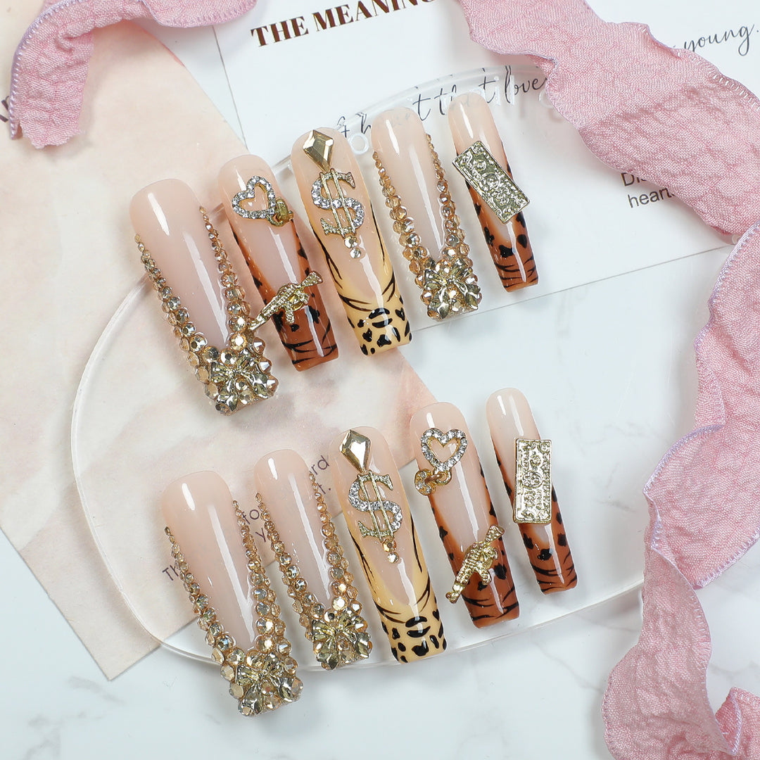 Kunstnagelset mit luxuriösen Glitzer- und Tiermotiven Karnz