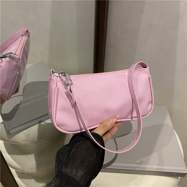 Elegante Patentleder-Clutch