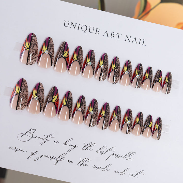 Künstlerisches Stiletto Press-On Nagelset mit floralem und abstraktem Design