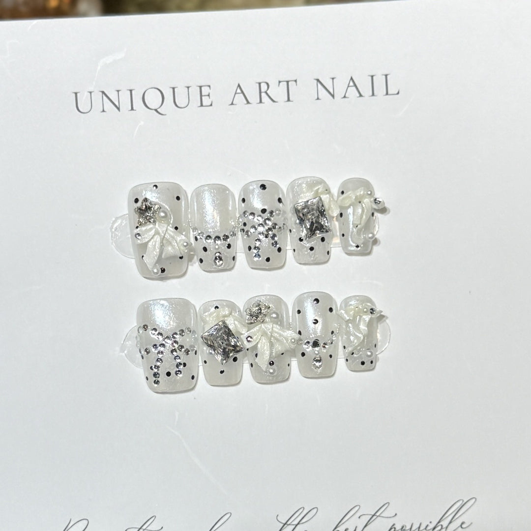 Elegantes Strassschleife Drucknagel-Set