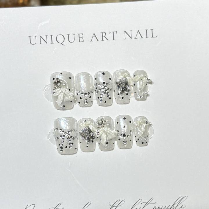 Elegantes Strassschleife Drucknagel-Set