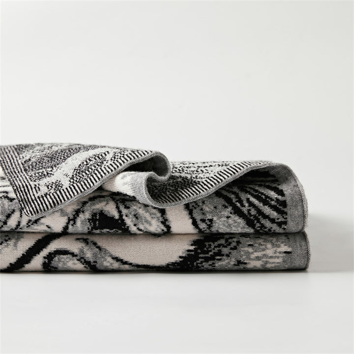 Kuschelige Wohndecke mit detailliertem Jacquard-Tiermotiv