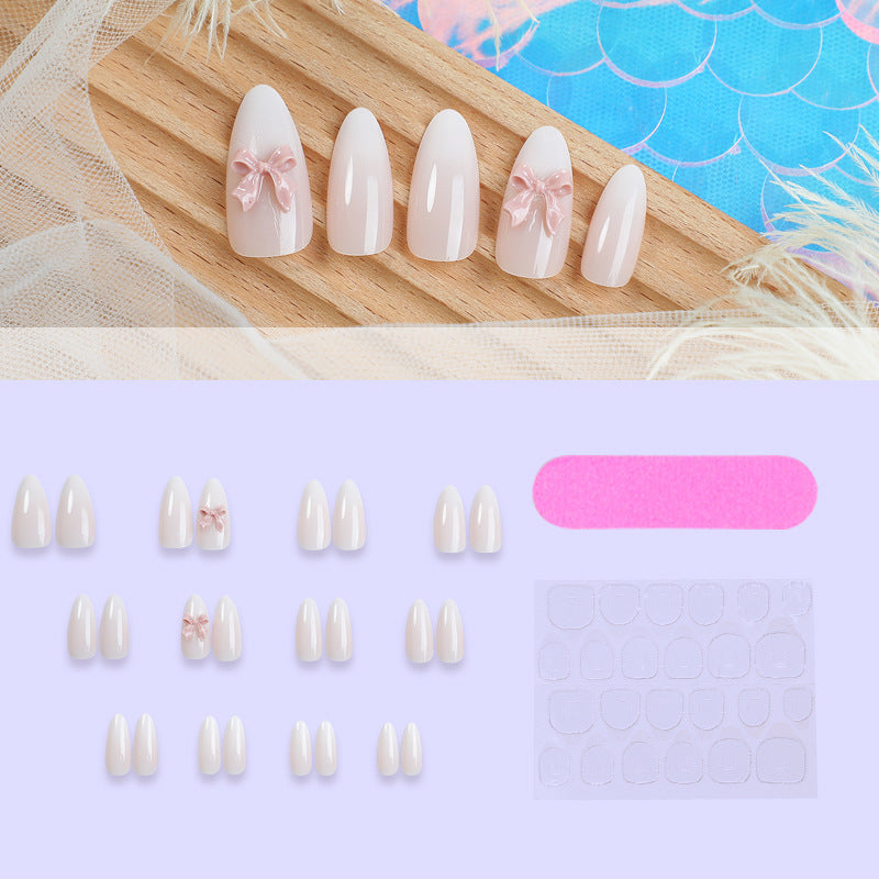 Elegantes Press-On Nail Art Set mit glänzender Oberfläche und süßen Schleifendetails Karnz