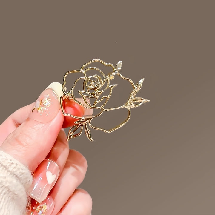 Elegante Rosé Brosche Karnz