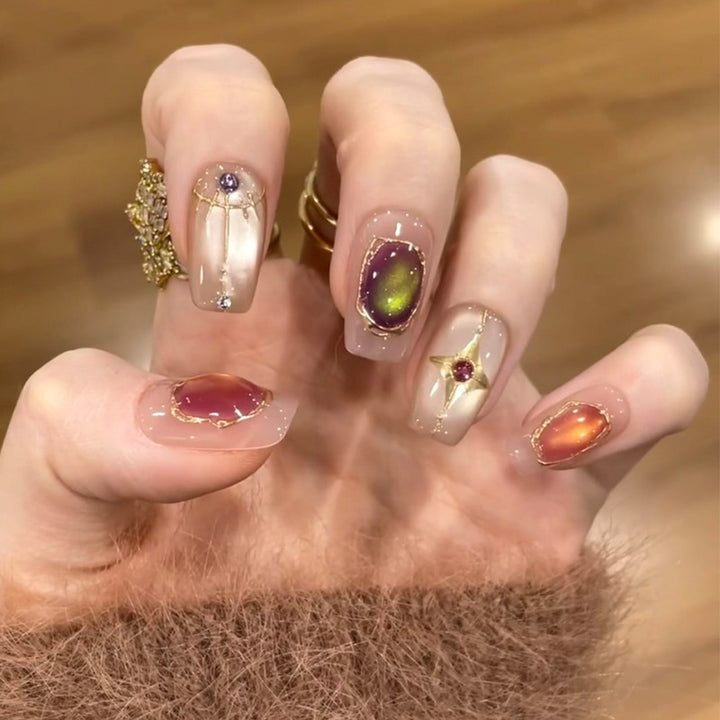 Dekoratives Press-On-Nagelset mit Stern- und Schleifenmotiven Karnz