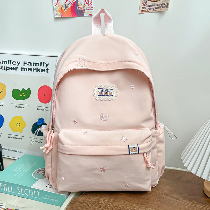 Stylischer backpack mit floralem Schmuck Karnz
