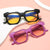 Damen geometrische Sonnenbrille mit markantem, hochwertigem Kunststoffrahmen Karnz