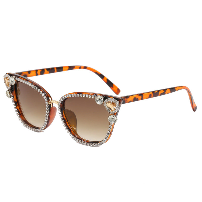 Damen Katzenaugen Sonnenbrille mit funkelnden Kristallverzierungen Karnz