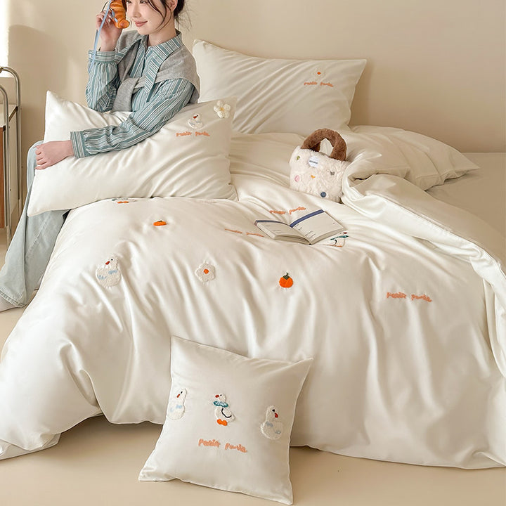 Umkehrbare bestickte Baumwollsatin Bettbezug Set mit verspielten Mini-Applikationsmotiven und Oxford Kissenbezügen