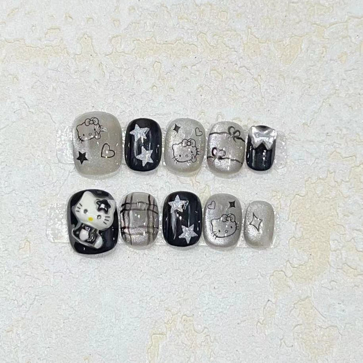 Spaß und verspieltes Press-On Nail Set mit Cartoon-Accents Karnz
